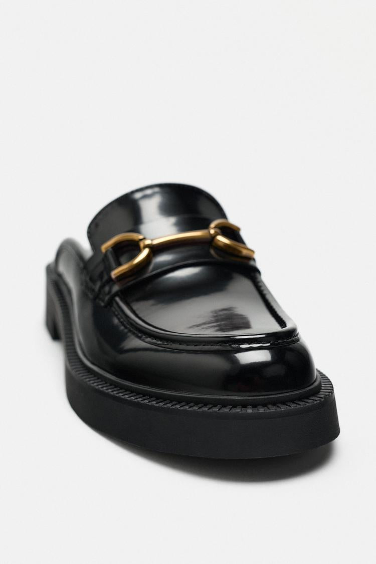 Open-back loafers with metallic detail